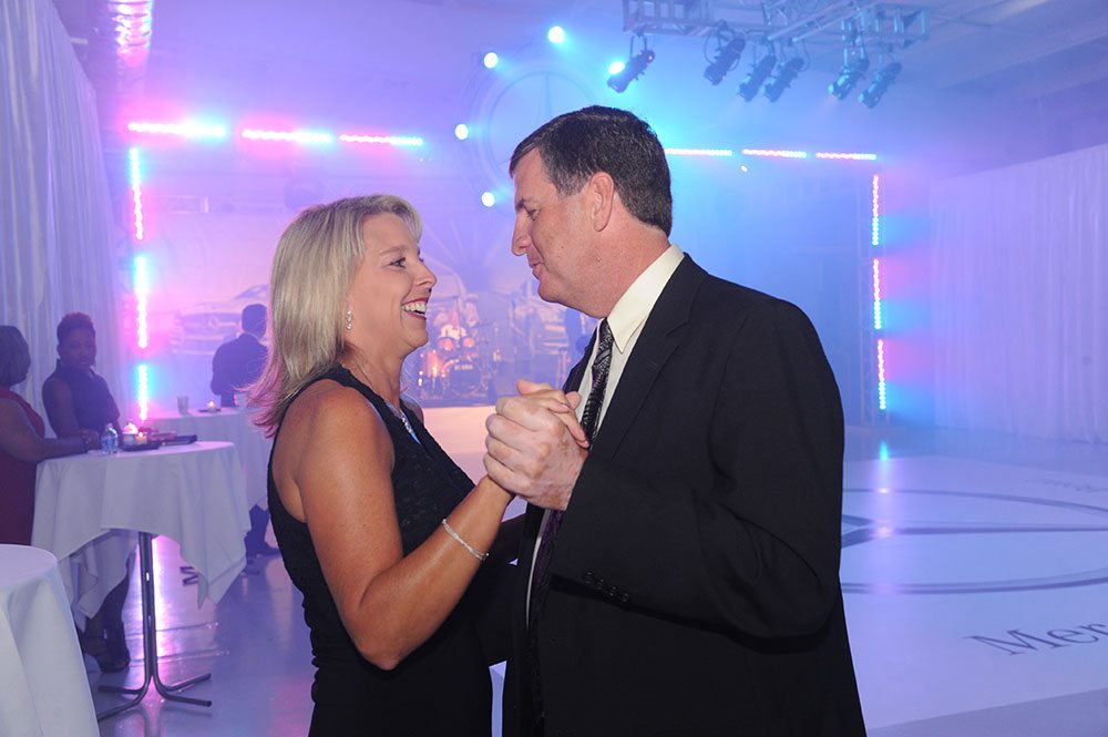 couple dancing at Mercedes-Benz of Mobile gala