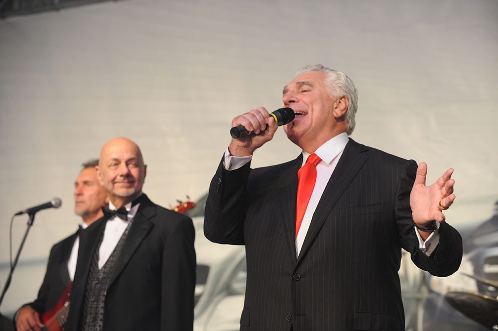 Ronnie Lamarque singing at Mercedes-Benz of Mobile grand opening gala
